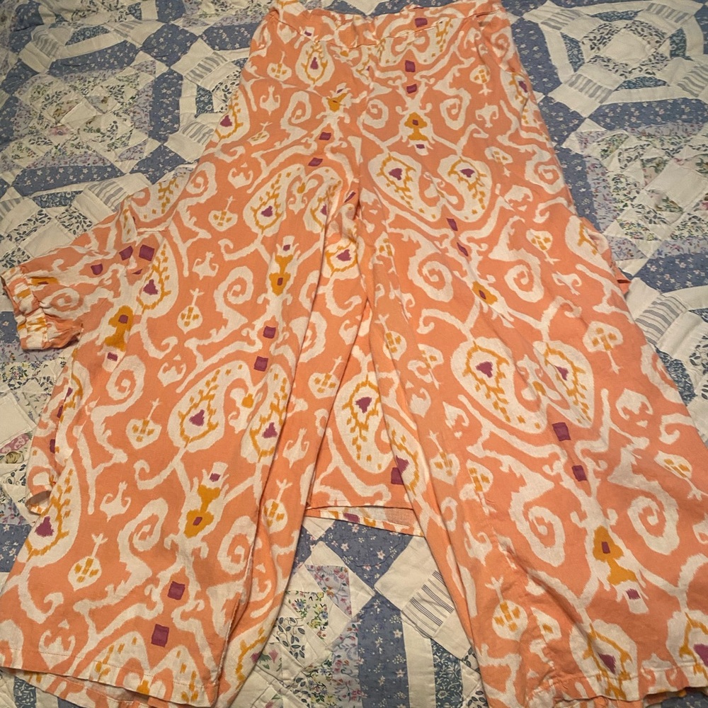 Christian Siriano Orange and White crop top and wide leg pants. Gently used.